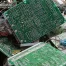 A pile of discarded circuit boards and electronic components, with wires tangled around them. TechWaste Recycling logo is visible in the top left corner.