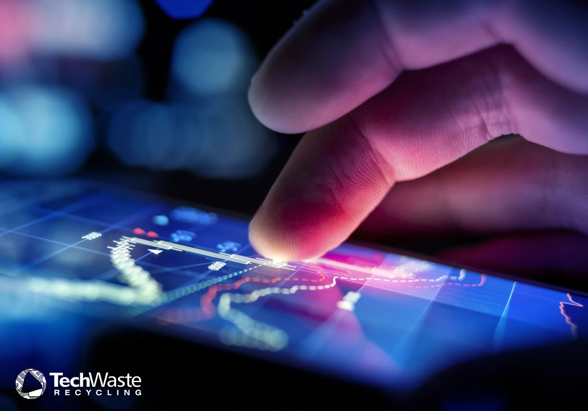 techwaste-blog-nist-sp-800-03 A close-up of a hand interacting with a touchscreen displaying financial graphs and data, with the TechWaste Recycling logo at the bottom left.
