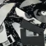 Shredded magnetic tape, broken floppy disks, and CDs are shown, illustrating electronic media ready for recycling. The TechWaste Recycling logo appears in the top left corner.